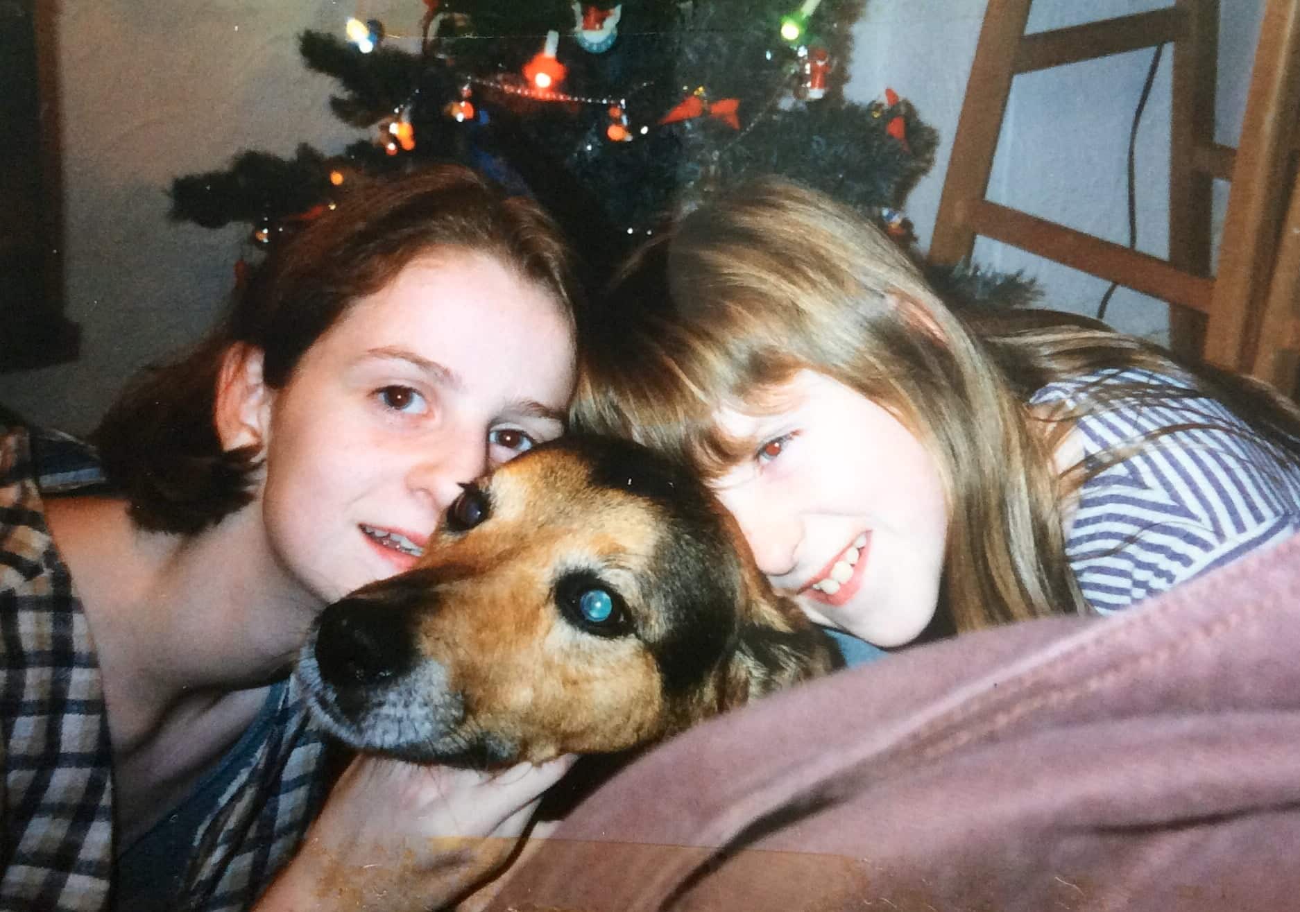 Shona McLean and her sister Sarah with Kim, their childhood pet.